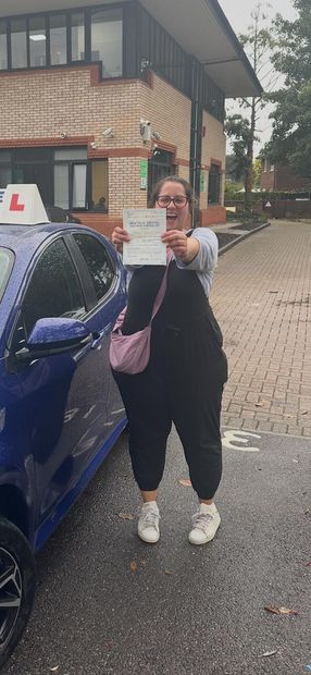 Pass Right Driving School pupil with their driving test pass certificate