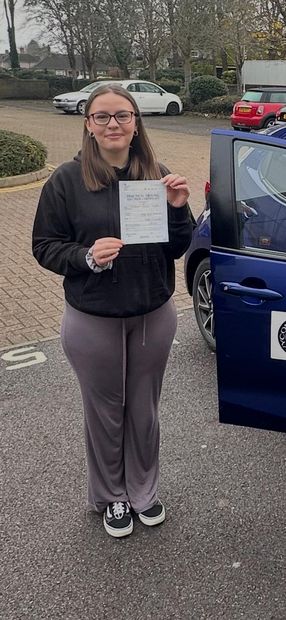 Pass Right Driving School pupil with their driving test pass certificate
