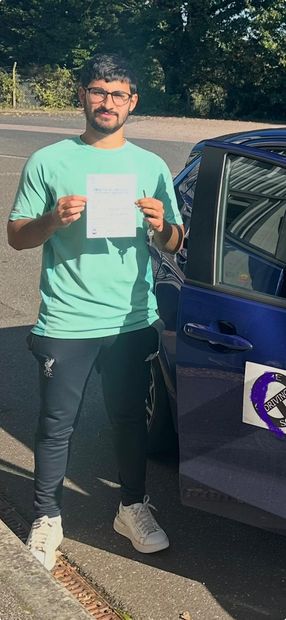 Pass Right Driving School pupil with their driving test pass certificate