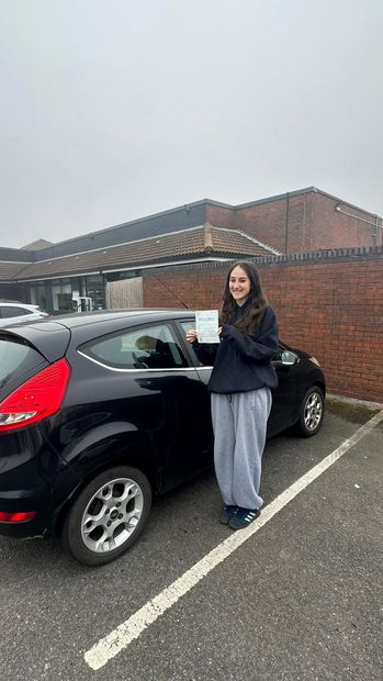 Pass Right Driving School pupil with their driving test pass certificate