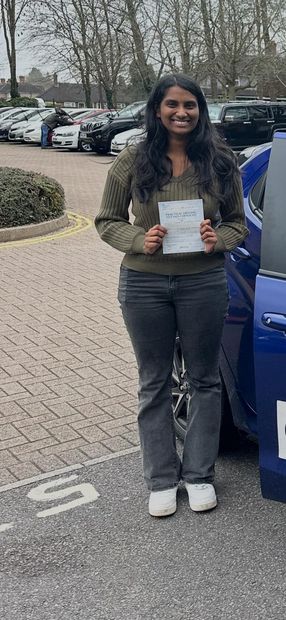 Pass Right Driving School pupil with their driving test pass certificate