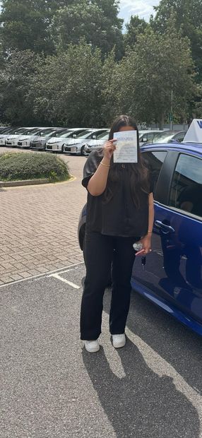 Pass Right Driving School pupil with their driving test pass certificate