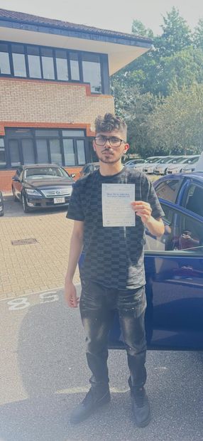 Pass Right Driving School pupil with their driving test pass certificate
