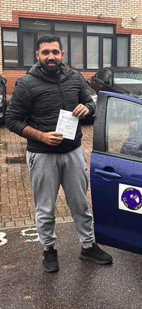 Pass Right Driving School pupil with their driving test pass certificate