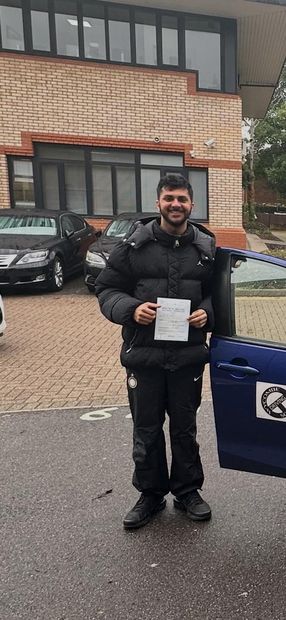 Pass Right Driving School pupil with their driving test pass certificate