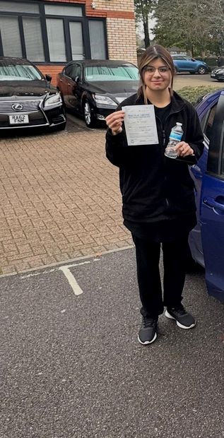 Pass Right Driving School pupil with their driving test pass certificate
