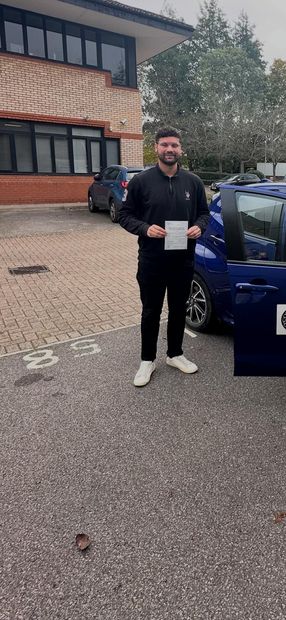 Pass Right Driving School pupil with their driving test pass certificate