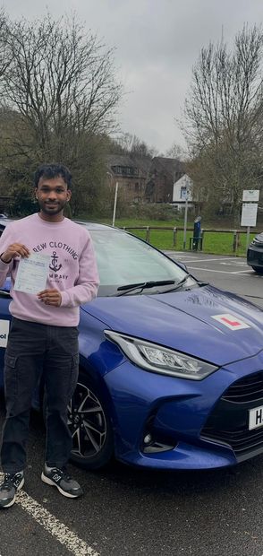 Pass Right Driving School pupil with their driving test pass certificate