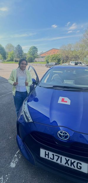 Pass Right Driving School pupil with their driving test pass certificate