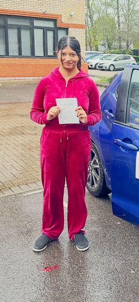 Pass Right Driving School pupil with their driving test pass certificate
