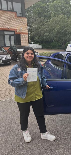 Pass Right Driving School pupil with their driving test pass certificate